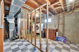 Basement utility closet and laundry room