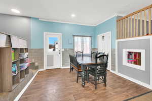 Dining area with access to yard, previously garage space.