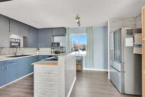 Kitchen with stainless steel appliances and island