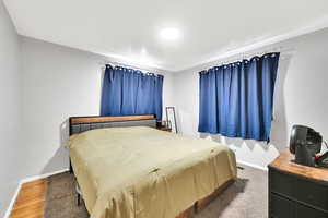 Bedroom with hardwood floors