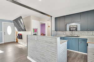 Kitchen with stainless steel appliances and island