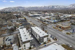 Birds eye view of property featuring a mountain view