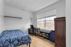 Multi-purpose room featuring hardwood / wood-style flooring