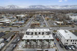 Birds eye view of property featuring a mountain view