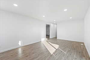 Empty room featuring light hardwood / wood-style floors