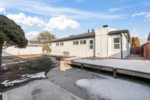 Rear view of property with a patio