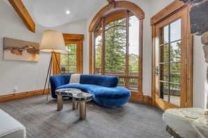 Living area featuring carpet floors and recessed lighting