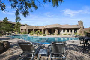 View of swimming pool featuring a patio