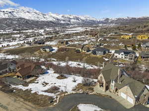 Snowy aerial view with a mountain view