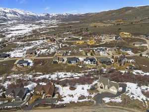 Snowy aerial view with a mountain view