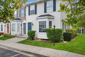 View of front of house with a front lawn