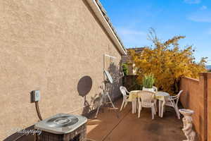 View of patio featuring central AC unit