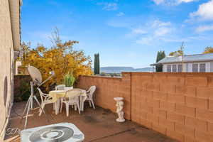 View of patio featuring cooling unit and a mountain view