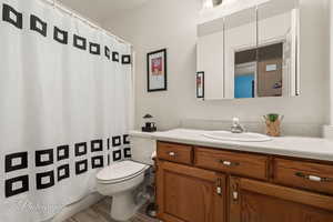 Bathroom with toilet and vanity