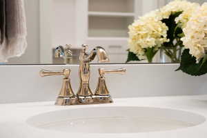 Primary bathroom featuring  double vanity and walk in shower