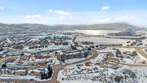 Snowy aerial view with a mountain view