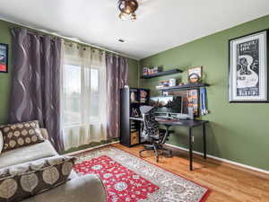 Office area featuring hardwood / wood-style floors