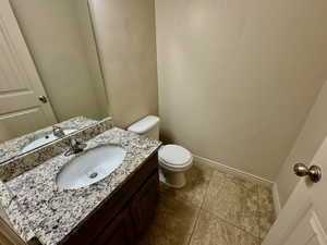 Bathroom with vanity and toilet