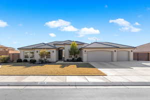 View of front of property with a garage