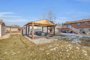 View of yard featuring a patio, cooling unit, and an outdoor fire pit