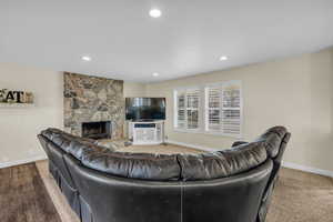 Living room featuring hardwood / wood-style floors and a fireplace