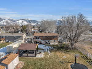 Exterior space featuring a mountain view and a shed