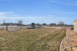 View of yard featuring a playground