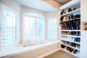 Walk in closet featuring tile patterned floors