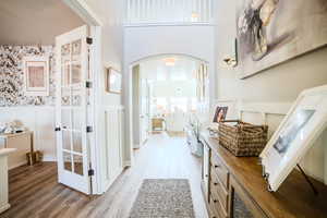 Corridor with light hardwood / wood-style floors