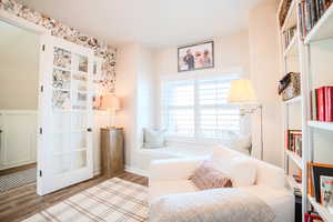 Living area featuring hardwood / wood-style flooring