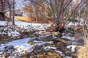 View of yard covered in snow