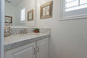 Bathroom featuring vanity