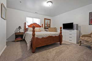 View of carpeted bedroom