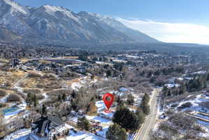 Snowy aerial view with a mountain view