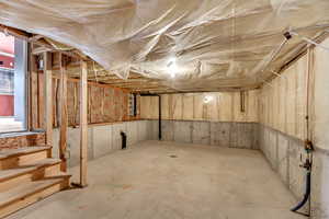 View of lower basement, lots of space for storage.