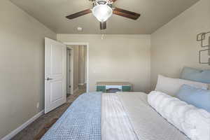 Bedroom with carpet flooring and ceiling fan