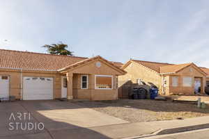 View of front of house with a garage