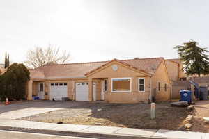 Single story home with a garage