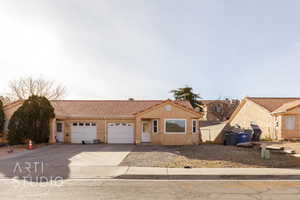 View of front of home featuring a garage