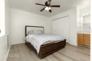 Bedroom featuring a closet, ceiling fan, and light wood-type flooring