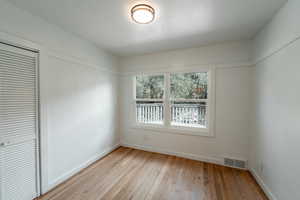 Interior space featuring light hardwood / wood-style floors and a closet