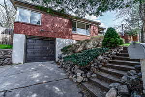 View of front of property with a garage