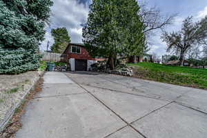 View of front of home featuring a garage