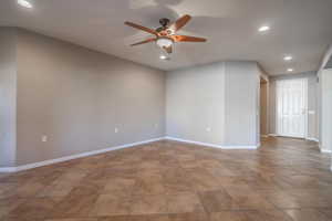 Living room featuring ceiling fan