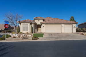 Mediterranean / spanish house featuring a 3 car garage