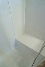 Bench in cultured marble walk-in shower