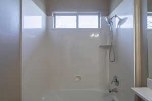 Bathroom featuring bathing tub / shower combination