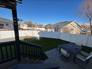 View of yard with a patio area