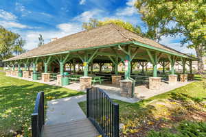 View of home's community featuring a gazebo and a lawn