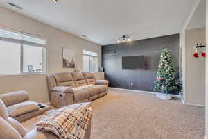 Living room with carpet floors